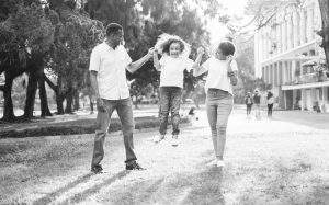 Cropped A Man And A Woman Assisting A Girl While Jumping 1128317 1 1.jpg