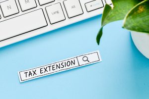 Tax Extension Text Concept. Search Line On Blue Background.