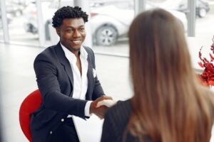 Excited buyer shaking hands with agent 4173198.jpg